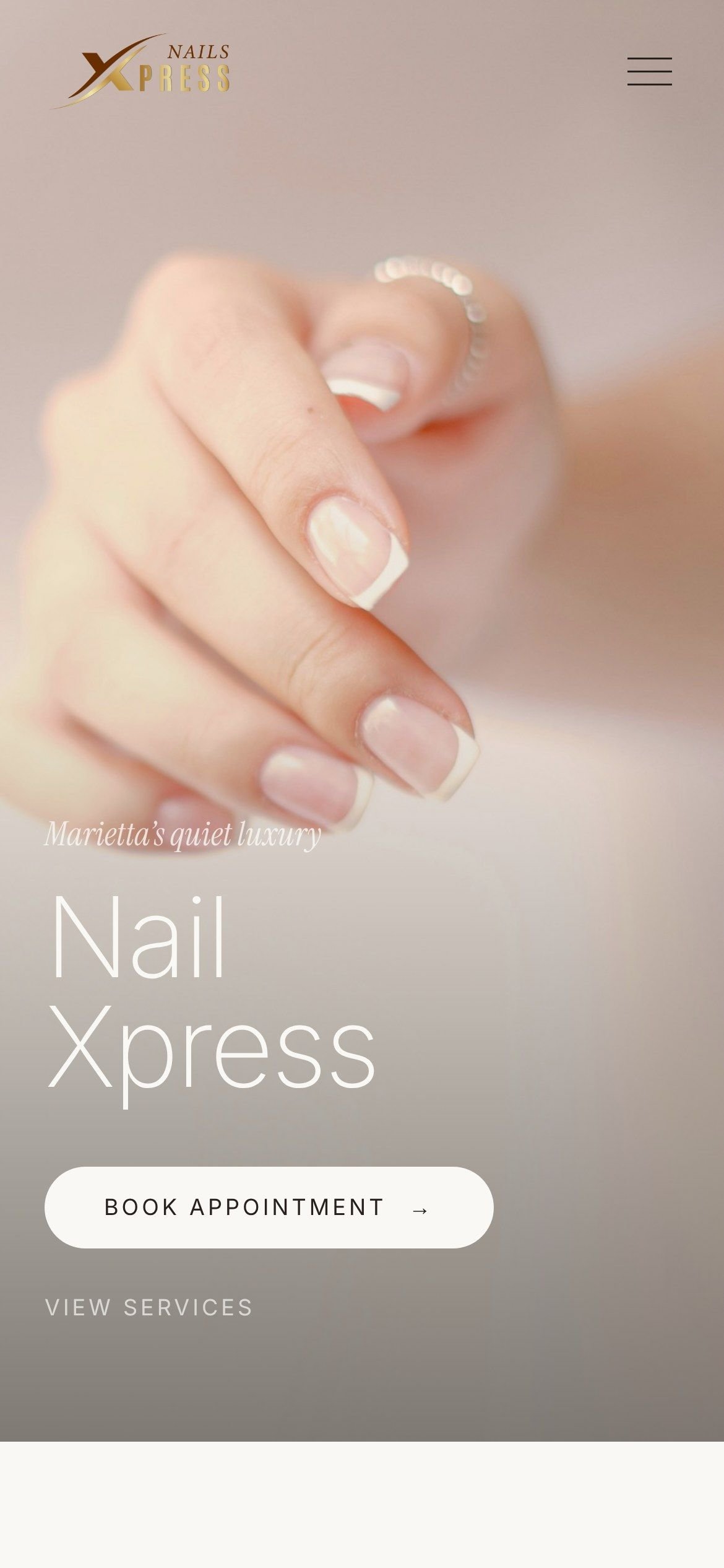 Nail Xpress homepage on a phone.
